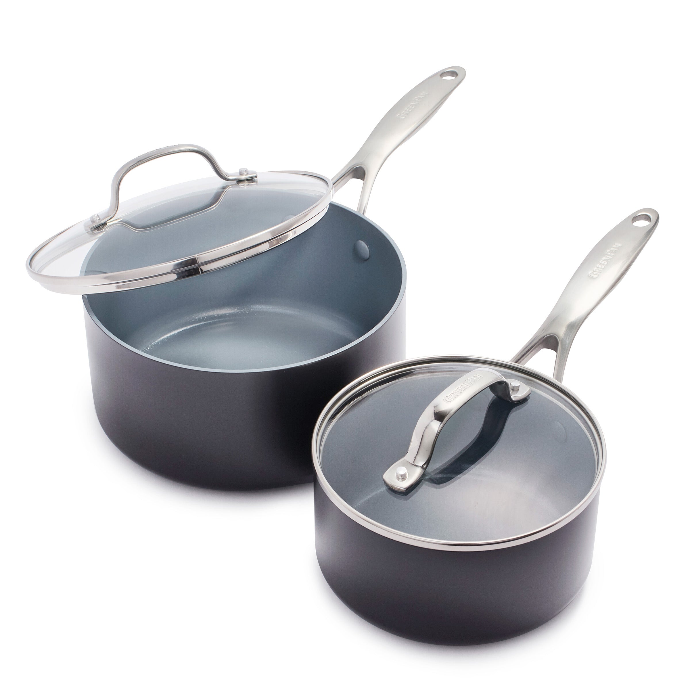The Valencia Pro Ceramic Nonstick 1.5-Quart and 3-Quart Saucepan Set with Lids in gray features two pans with silver handles and glass lids. Both offer excellent scratch resistance and light-colored interiors.